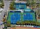 Aerial view of well-maintained pickleball and tennis courts at 1401 Bay Palm Blvd, Indian Rocks Beach, FL 33785