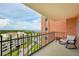 Spacious balcony with rocking chair and water view at 1120 N Shore Ne Dr # 903, St Petersburg, FL 33701