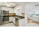 Kitchen with granite countertops and stainless steel appliances at 1120 N Shore Ne Dr # 903, St Petersburg, FL 33701