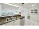 Kitchen with granite countertops and stainless steel appliances at 1120 N Shore Ne Dr # 903, St Petersburg, FL 33701