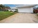 White garage door and driveway at 14542 Anchorage Cir, Seminole, FL 33776