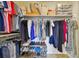 Walk-in closet with an array of clothes and shoe storage at 2527 W Maryland Ave # A, Tampa, FL 33629