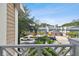 A view of the street and neighborhood featuring well-maintained homes and landscaping from a balcony at 2527 W Maryland Ave # A, Tampa, FL 33629