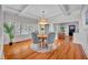 Elegant dining room with hardwood floors and a beautiful light fixture at 455 13Th Ne Ave, St Petersburg, FL 33701