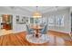 Dining area with hardwood floors and a round wooden table at 455 13Th Ne Ave, St Petersburg, FL 33701