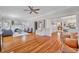 Open living room with hardwood floors and view into kitchen area at 455 13Th Ne Ave, St Petersburg, FL 33701