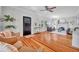 Living room with hardwood floors, fireplace, and seating at 455 13Th Ne Ave, St Petersburg, FL 33701