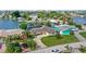 Bird's eye view showcasing a charming house and its waterfront location at 613 79Th S Cir, St Petersburg, FL 33707