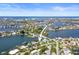 Wide aerial showcasing the property's waterfront location and neighborhood at 613 79Th S Cir, St Petersburg, FL 33707