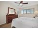 Bedroom with a dresser and a comfortable bed at 613 79Th S Cir, St Petersburg, FL 33707