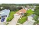 Single-story house with a two-car garage and a well-maintained lawn in a quiet neighborhood at 11609 Weaver Park Ct, Trinity, FL 34655