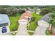 Single-story house with a two-car garage and spacious yard in a residential neighborhood at 11609 Weaver Park Ct, Trinity, FL 34655