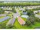 Aerial view of residential neighborhood with cul-de-sac and green spaces at 11609 Weaver Park Ct, Trinity, FL 34655