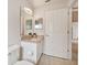 Bathroom with vanity, toilet, and tiled floor at 11609 Weaver Park Ct, Trinity, FL 34655