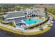 Aerial view of community clubhouse and pool area at 11609 Weaver Park Ct, Trinity, FL 34655