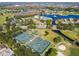 Aerial view of community tennis courts at 11609 Weaver Park Ct, Trinity, FL 34655