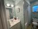 Clean bathroom with a shower/tub combo at 4313 Hollow Hill Dr, Tampa, FL 33624