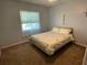 Comfortable bedroom offers ample space and natural light at 4313 Hollow Hill Dr, Tampa, FL 33624