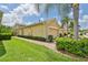 House exterior showcasing landscaping and brick walkway at 806 Chipper Dr, Sun City Center, FL 33573