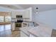 Well-equipped kitchen with stainless steel appliances and ample counter space at 10922 Brucehaven Dr, Riverview, FL 33578