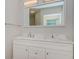 Bathroom features double vanity with marble countertop at 705 Bayshore Dr, Tarpon Springs, FL 34689