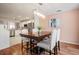 Dining room with a dark wood table and view of kitchen at 2553 Harn Blvd # 5, Clearwater, FL 33764