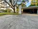 A convenient carport and parking area at 3157 Mission Grove Dr, Palm Harbor, FL 34684