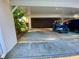 Spacious covered carport area with storage, offering convenient parking and protection from the elements at 3157 Mission Grove Dr, Palm Harbor, FL 34684
