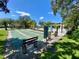 Enjoy a sunny afternoon at the community shuffleboard court, complete with benches for relaxing between games at 3157 Mission Grove Dr, Palm Harbor, FL 34684