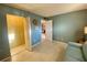 Spacious spare room with blue walls, tile flooring, closet and adjoining room at 3157 Mission Grove Dr, Palm Harbor, FL 34684