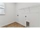 Laundry room with tile flooring and window at 1692 Fallon Pass, Zephyrhills, FL 33541
