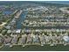 Aerial view of waterfront community with many homes and canals at 415 Islebay Dr, Apollo Beach, FL 33572