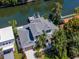 Luxury waterfront home with a large backyard and private dock at 4923 W Melrose N Ave, Tampa, FL 33629