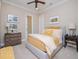Charming bedroom featuring a queen-size bed and neutral color scheme at 4923 W Melrose N Ave, Tampa, FL 33629