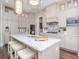 Gourmet kitchen featuring granite countertops and custom cabinetry at 4923 W Melrose N Ave, Tampa, FL 33629