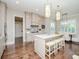 Modern kitchen with large island and stainless steel appliances at 4923 W Melrose N Ave, Tampa, FL 33629