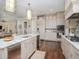 Gourmet kitchen features granite countertops, stainless steel appliances, and ample cabinetry at 4923 W Melrose N Ave, Tampa, FL 33629
