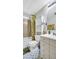 Clean bathroom with shower/tub combo and updated vanity at 15 Hamilton Ln # 7, Palm Harbor, FL 34684
