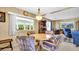 Cozy dining area with a round table and four chairs at 15 Hamilton Ln # 7, Palm Harbor, FL 34684