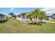 Charming single-wide home with palm trees at 15 Hamilton Ln # 7, Palm Harbor, FL 34684
