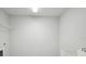 Laundry room with overhead shelving and a sink at 3437 Yellow Leaf Cir, Spring Hill, FL 34609