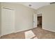 Carpeted bedroom featuring a large closet at 7806 Grasmere Dr, Land O Lakes, FL 34637
