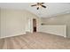 Bedroom with vaulted ceiling, fan, and carpeted floors at 7806 Grasmere Dr, Land O Lakes, FL 34637