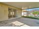 Spacious screened porch with concrete floors at 7806 Grasmere Dr, Land O Lakes, FL 34637