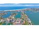 Aerial view showing location of property near water at 10369 Paradise Blvd # 58, Treasure Island, FL 33706