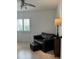 Bedroom with couch and side table at 10369 Paradise Blvd # 58, Treasure Island, FL 33706