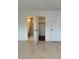 Bedroom with bathroom and closet access at 10369 Paradise Blvd # 58, Treasure Island, FL 33706