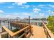 Private wooden dock offers convenient boat access at 10369 Paradise Blvd # 58, Treasure Island, FL 33706