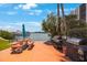 Enjoy grilling with waterfront views at this community's picnic area at 10369 Paradise Blvd # 58, Treasure Island, FL 33706