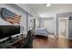 Bedroom with a bed, workspace, and access to a bathroom at 1118 2Nd S Ave, Tierra Verde, FL 33715